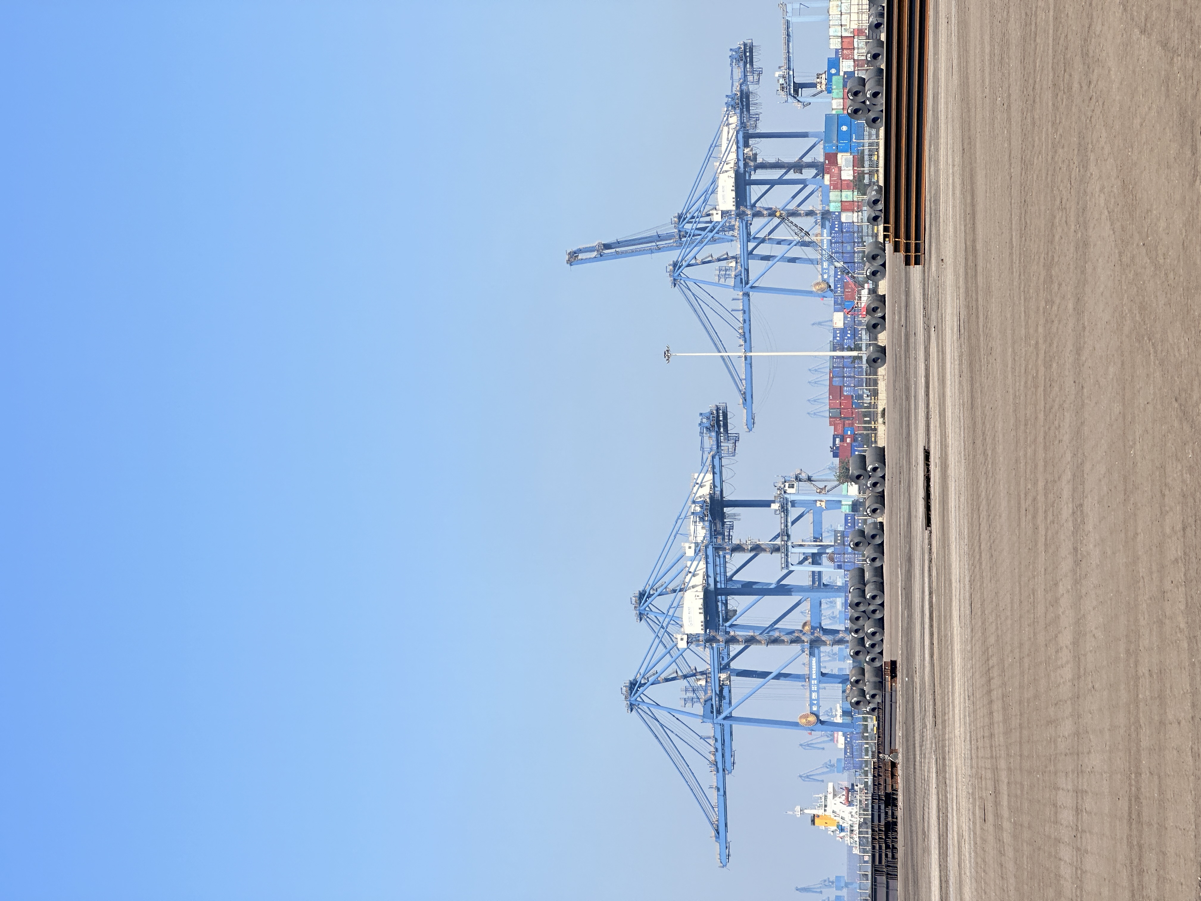 Bulk port and yard scene reflecting sourcing and distribution choices in regional trade