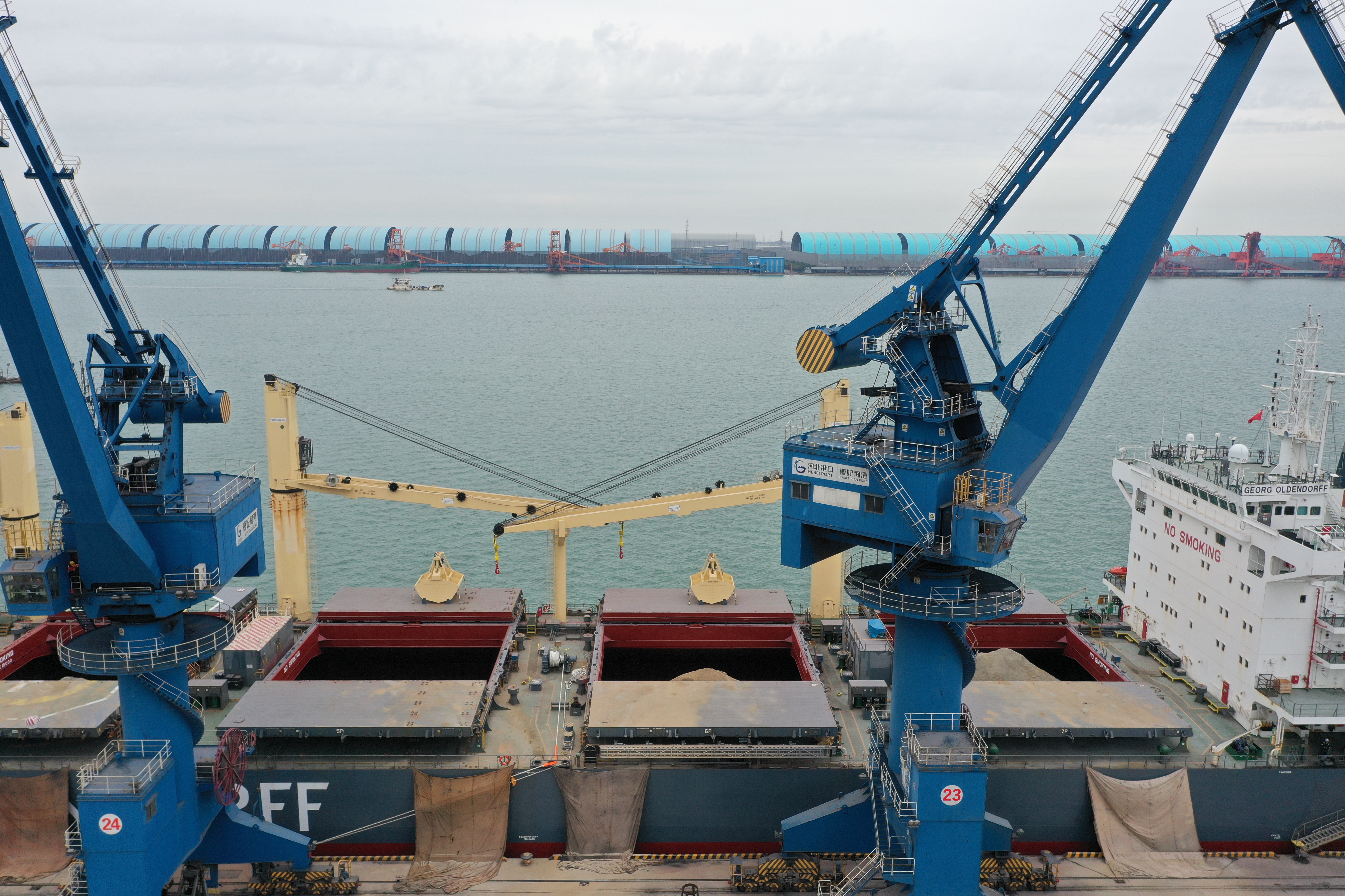 Port loading image showing that execution and transport systems shape real supply